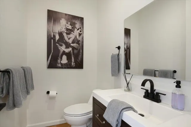 a bathroom with a sink and a toilet