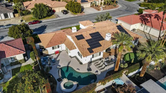 an aerial view of a house with garden