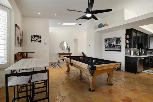 a room with furniture and a flat screen tv