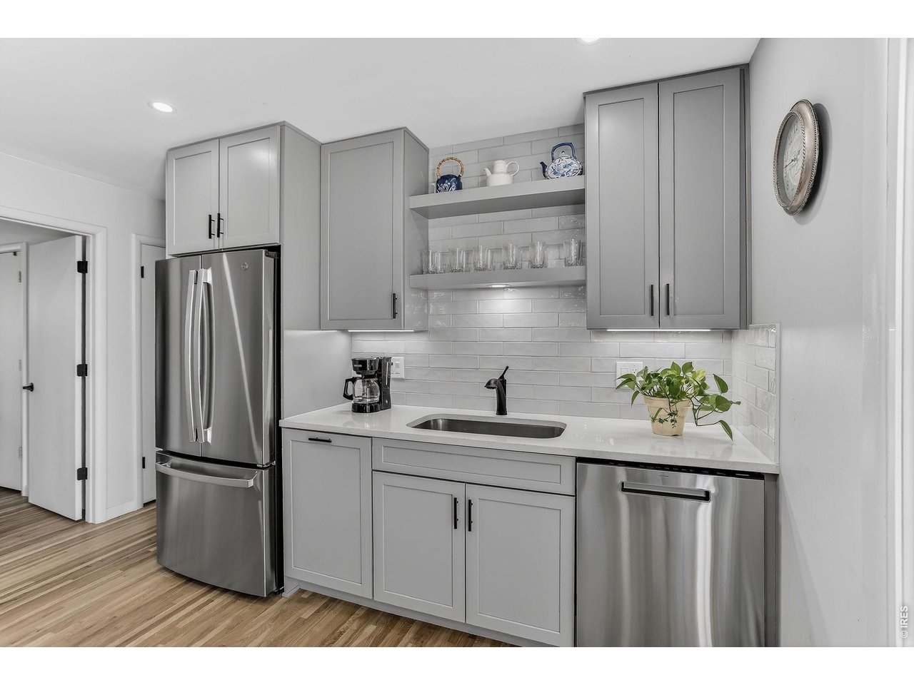 265 South 39th Street Boulder, CO 80305 - Photo 13 of 34 a kitchen with stainless steel appliances granite countertop a refrigerator sink and cabinets