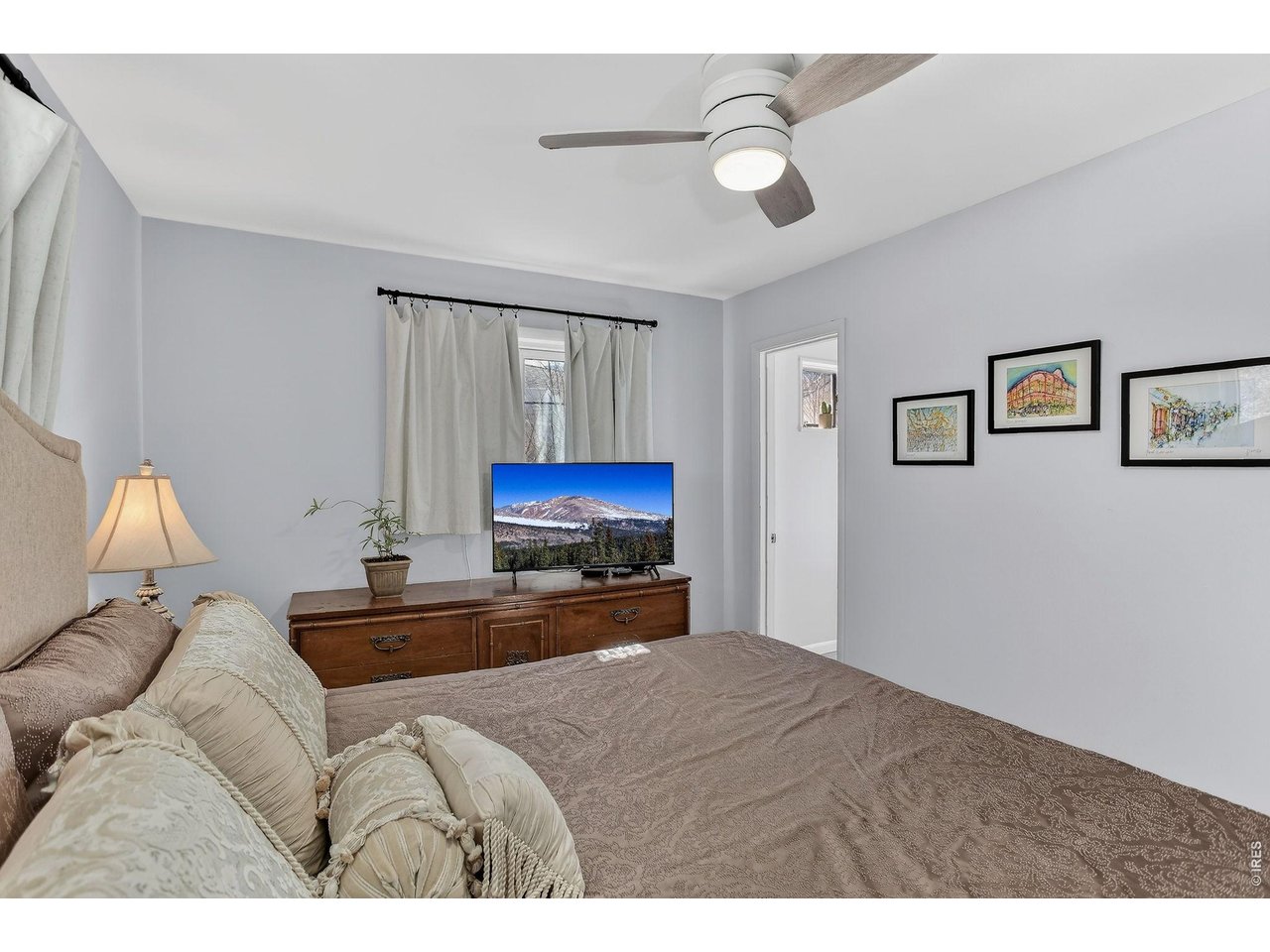 265 South 39th Street Boulder, CO 80305 - Photo 15 of 34 a living room with furniture and a flat screen tv