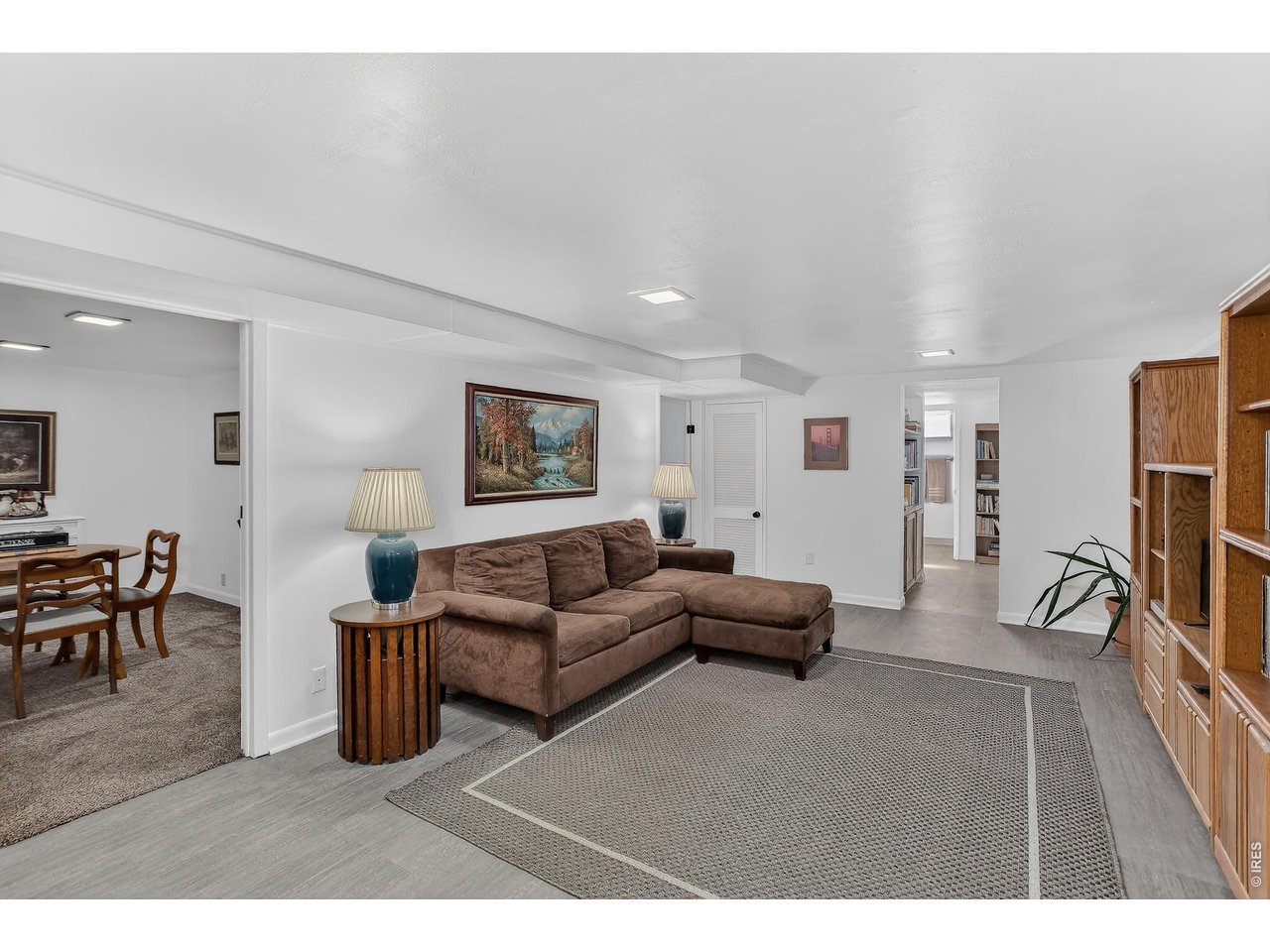 265 South 39th Street Boulder, CO 80305 - Photo 22 of 34 a living room with furniture and a flat screen tv