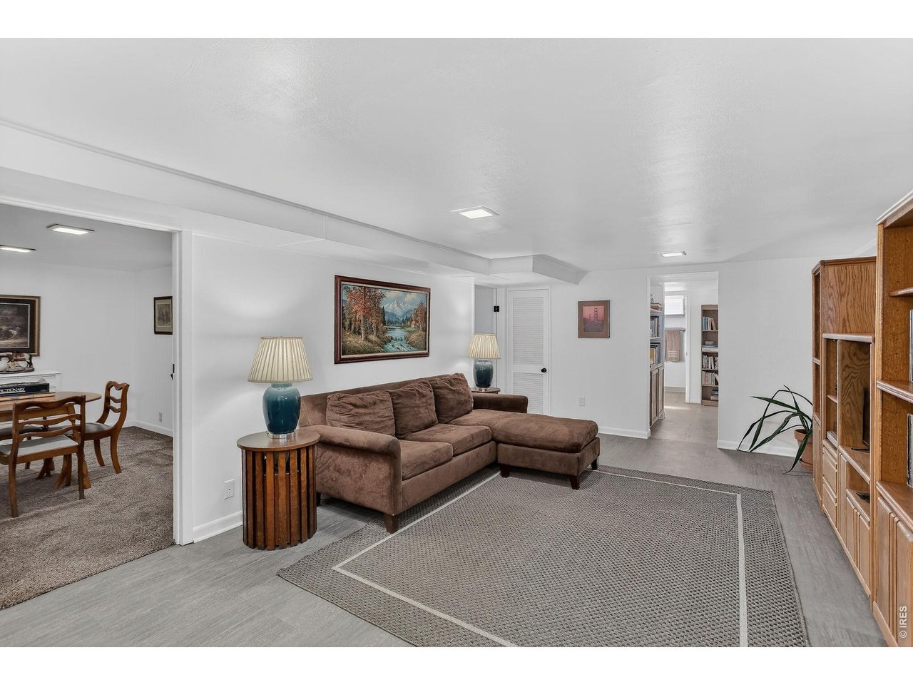 265 South 39th Street Boulder, CO 80305 - Photo 23 of 34 a living room with furniture and a flat screen tv