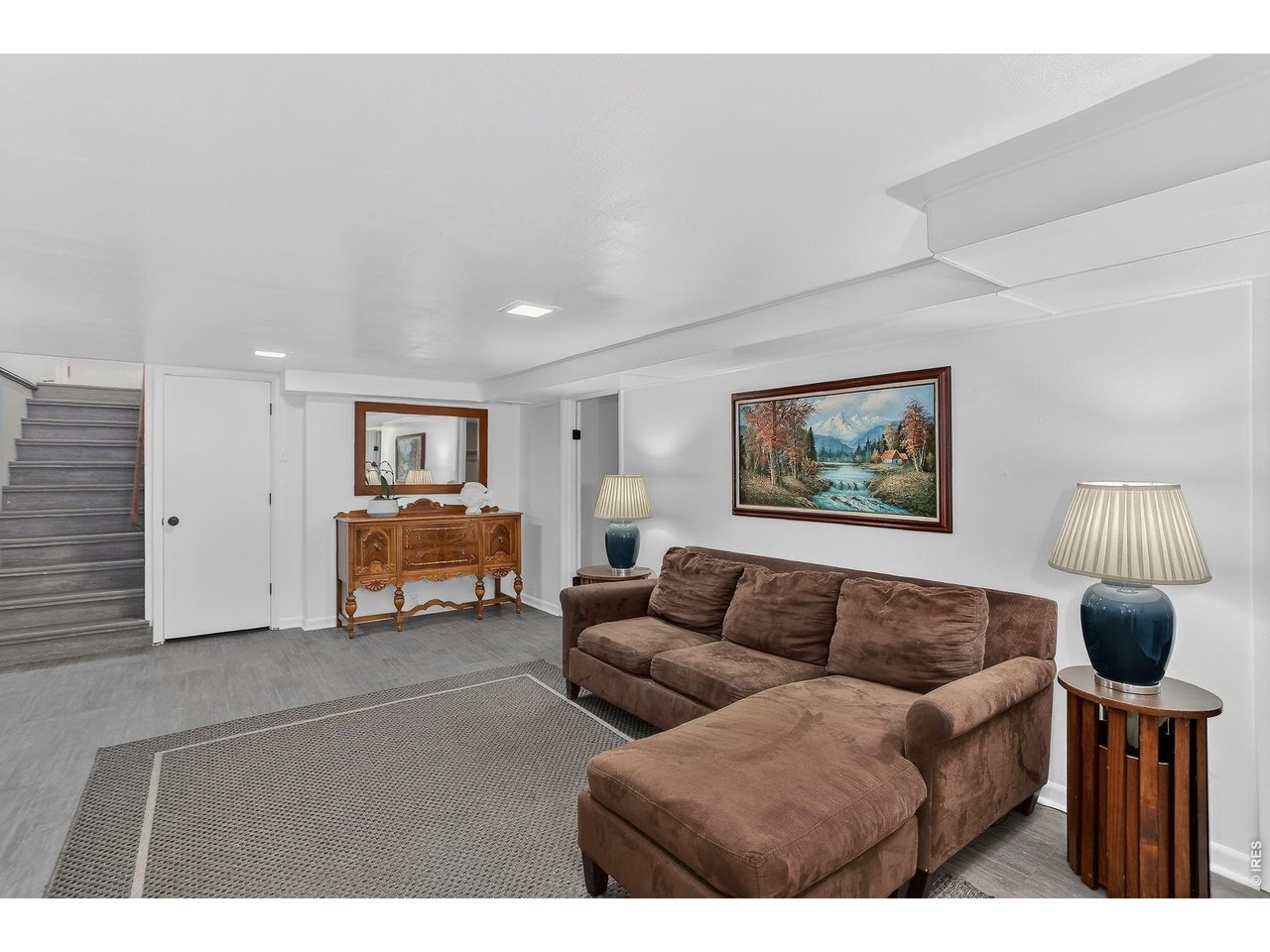 265 South 39th Street Boulder, CO 80305 - Photo 24 of 34 a living room with furniture and a flat screen tv
