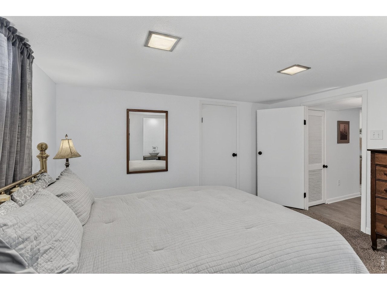 265 South 39th Street Boulder, CO 80305 - Photo 29 of 34 a bedroom with a bed and a window