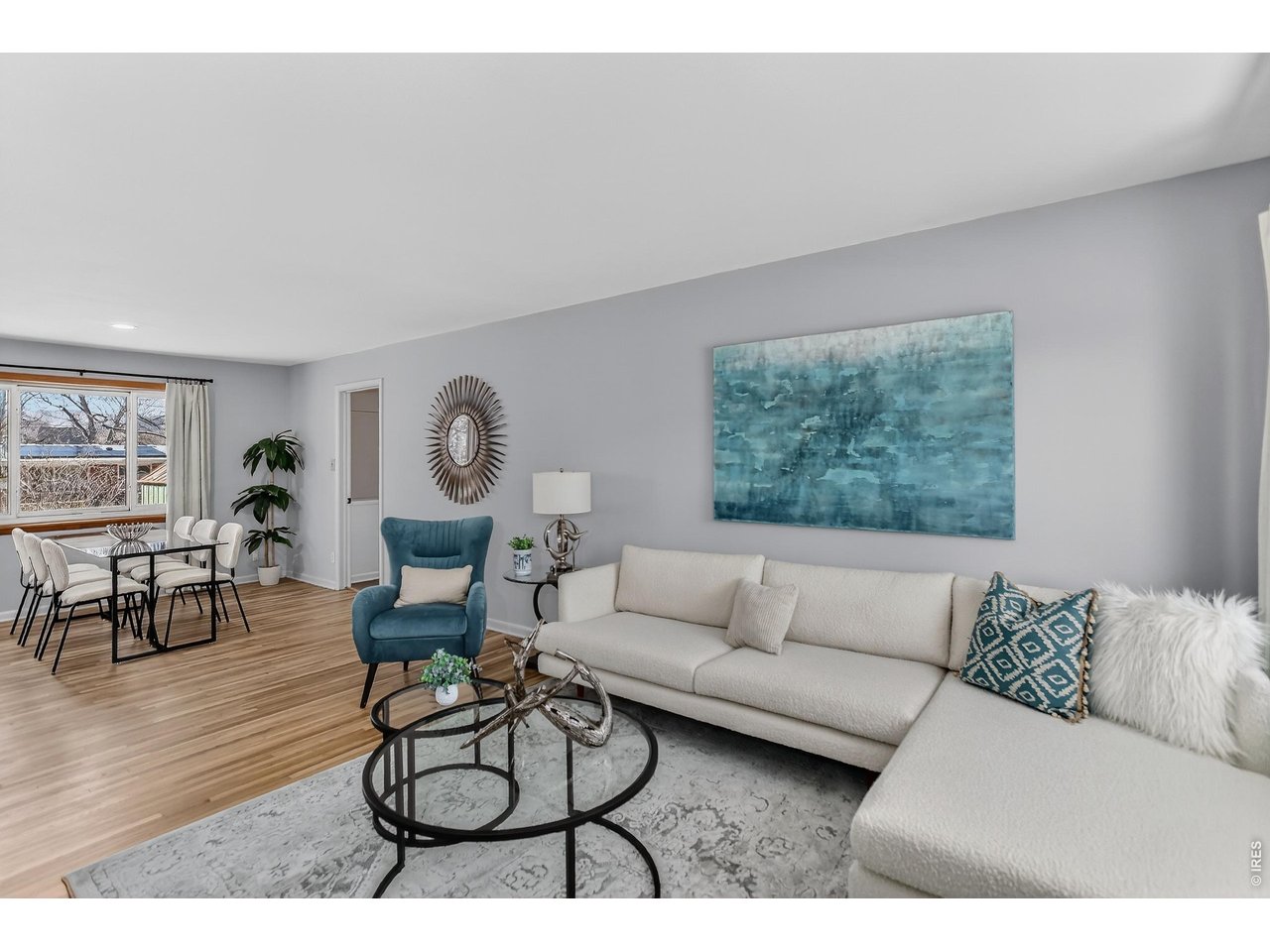 265 South 39th Street Boulder, CO 80305 - Photo 4 of 34 a living room with furniture a rug potted plant and a window
