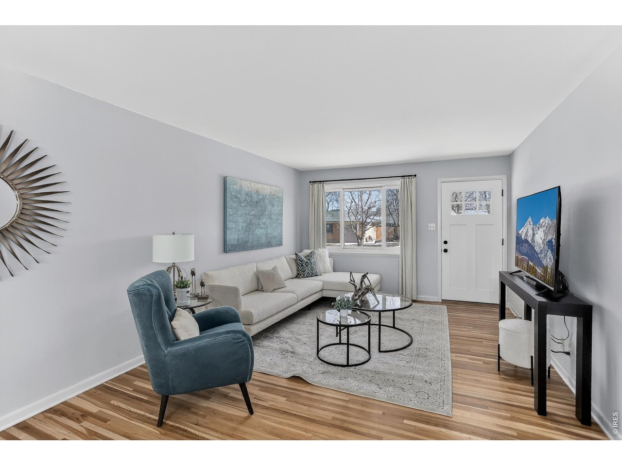 265 South 39th Street Boulder, CO 80305 - Photo 5 of 34 a living room with furniture a rug and a window