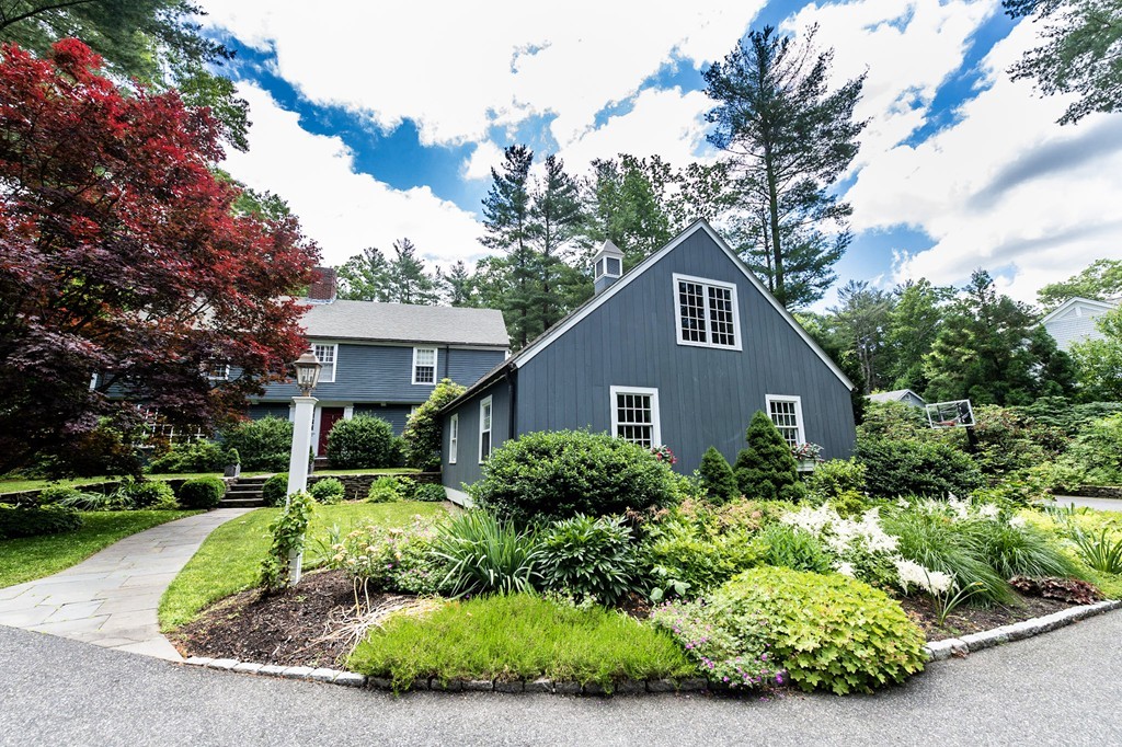 21 Ridge Hill Farm Road Wellesley, MA 02482 - Photo 1 of 1 a front view of house with yard and green space