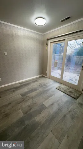 a backyard of a house with large trees