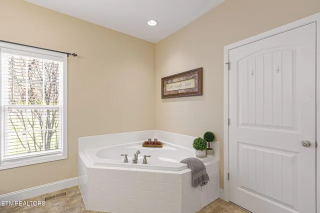 a bathroom with a sink and a bathtub