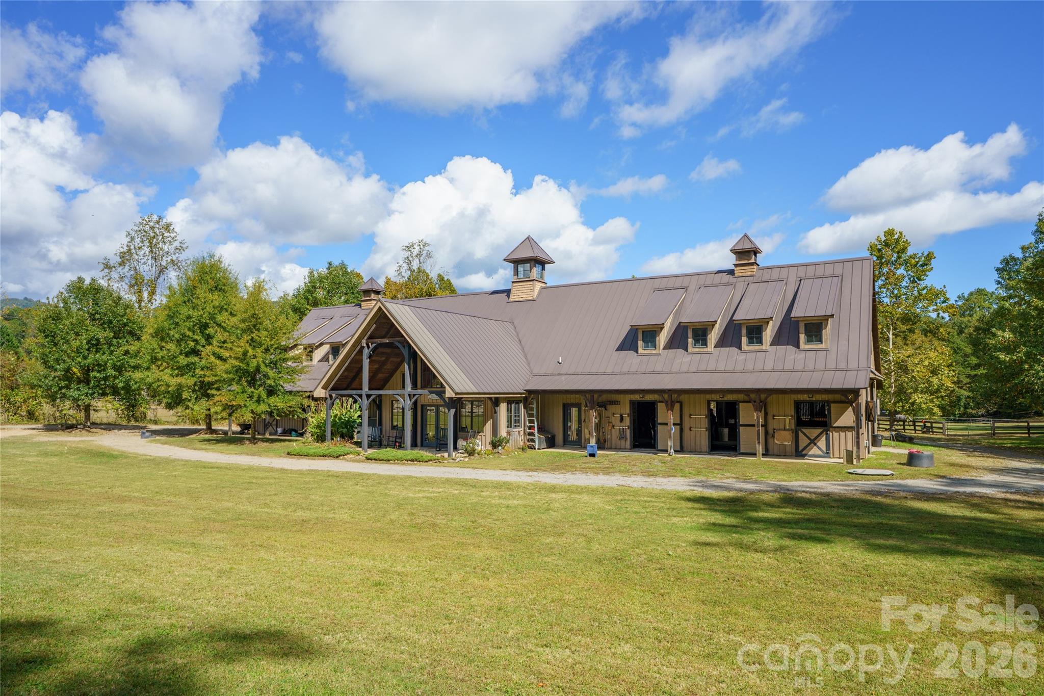 0 Deep Gap Farm Road East, Unit 2372021 Mill Spring, NC 28756 - Photo 6 of 35 a front view of a house with a yard
