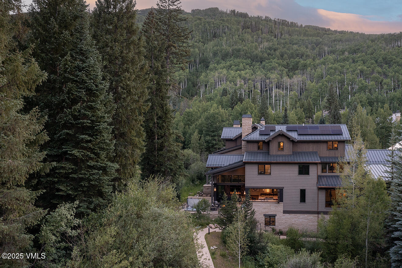 187 Elk Track Road Beaver Creek, CO 81620 - Photo 15 of 19 an aerial view of a house with a yard