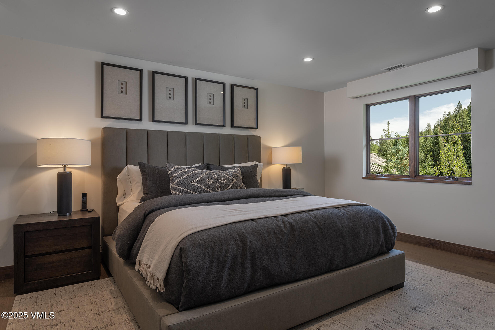 187 Elk Track Road Beaver Creek, CO 81620 - Photo 18 of 19 a bed room with a bed and a night stand