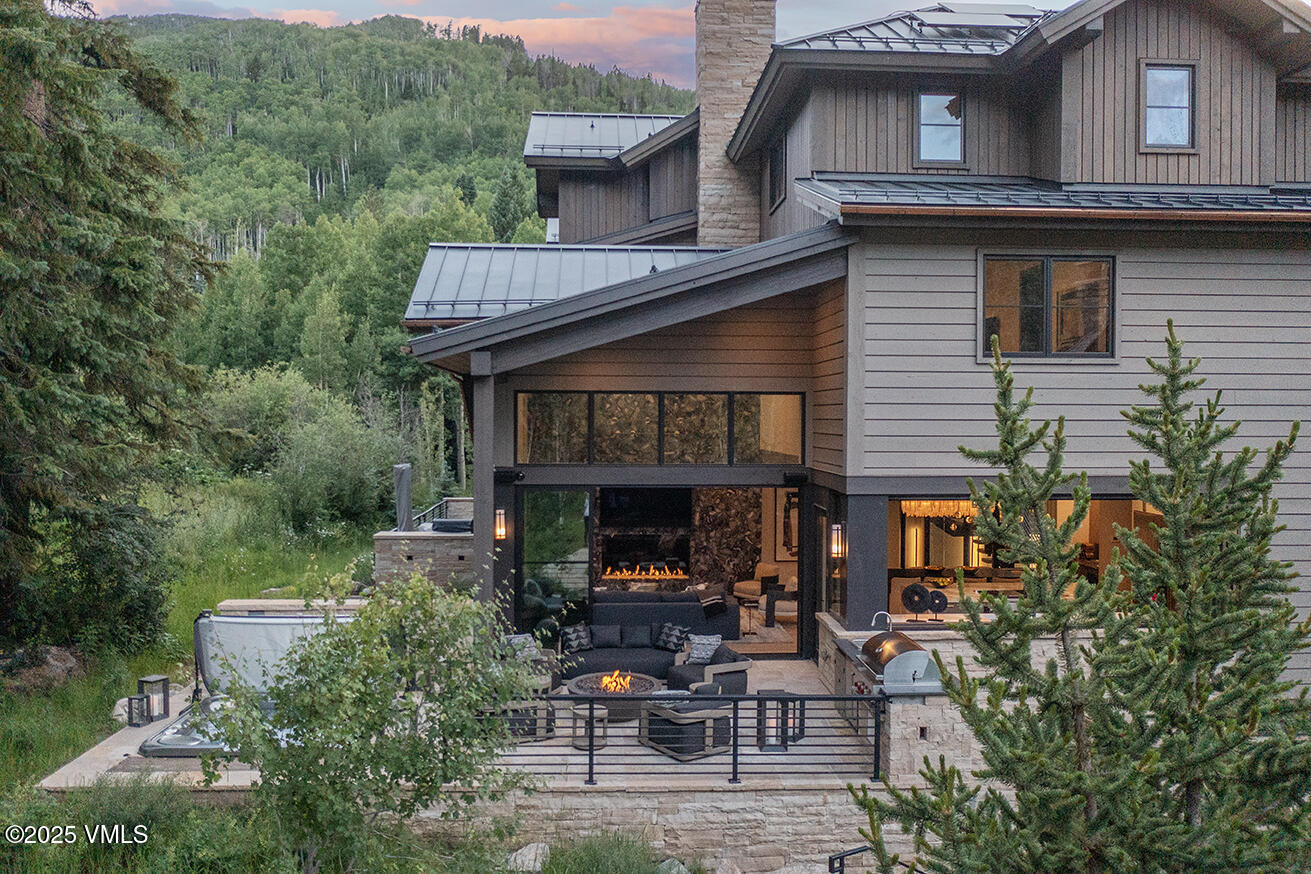 187 Elk Track Road Beaver Creek, CO 81620 - Photo 3 of 19 a view of house with outdoor seating space