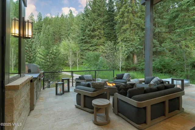 a outdoor living space with furniture and garden view