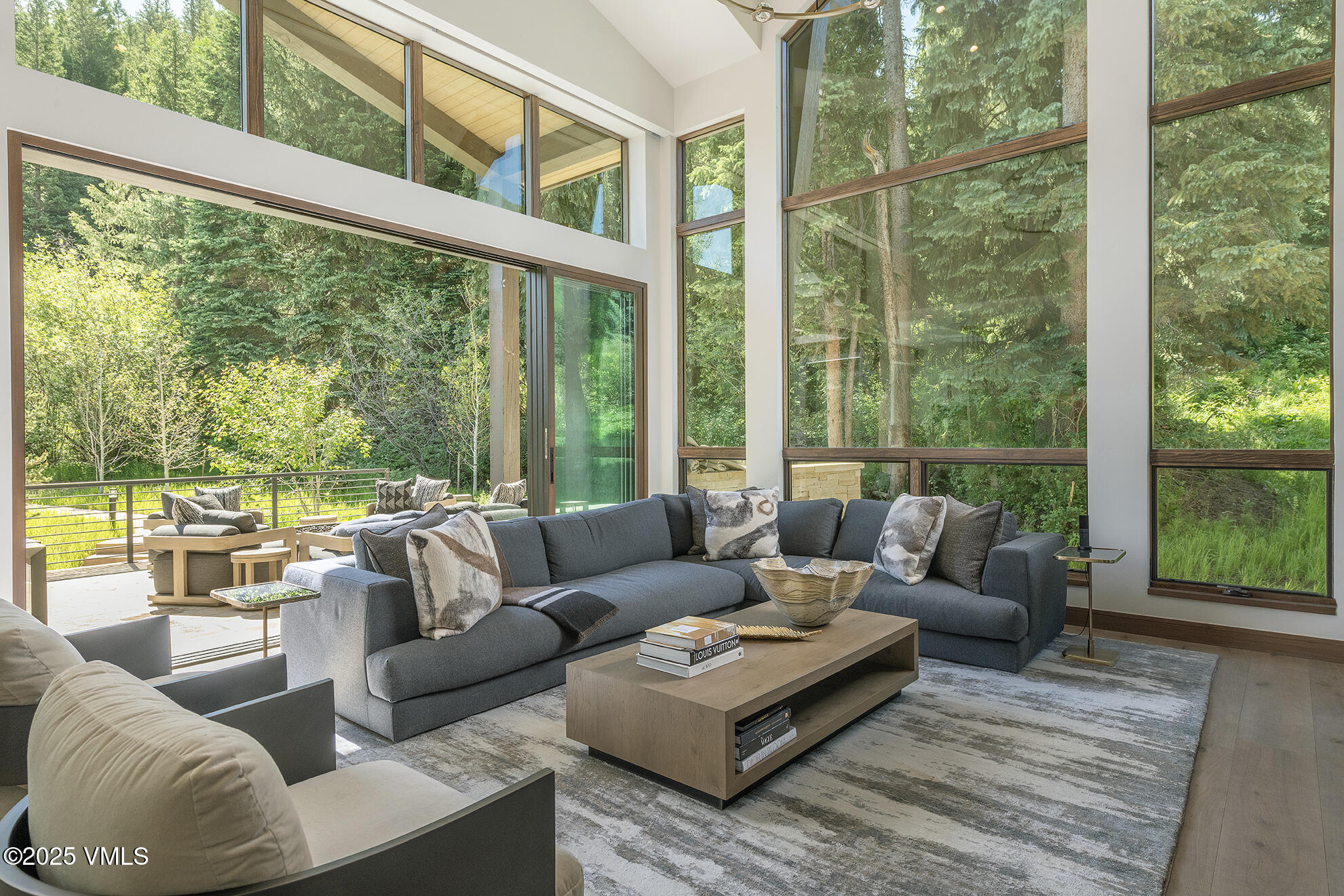 187 Elk Track Road Beaver Creek, CO 81620 - Photo 7 of 19 a living room with furniture and a large window
