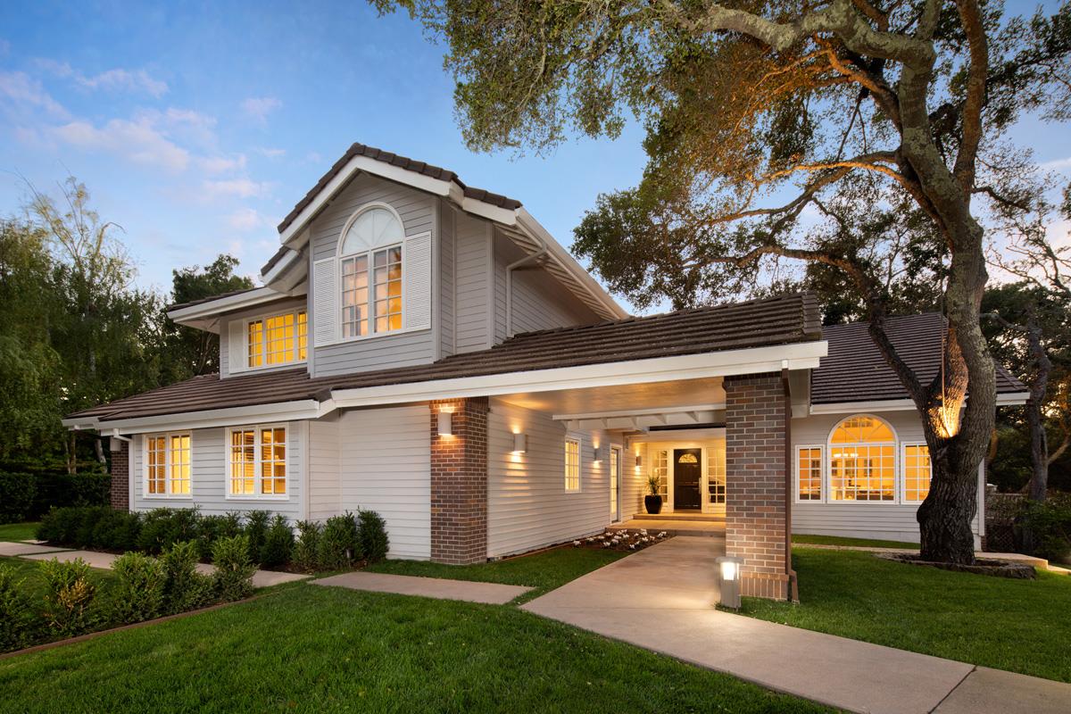 340 Jane Drive Woodside, CA 94062 - Photo 1 of 48 a front view of a house with a yard and trees