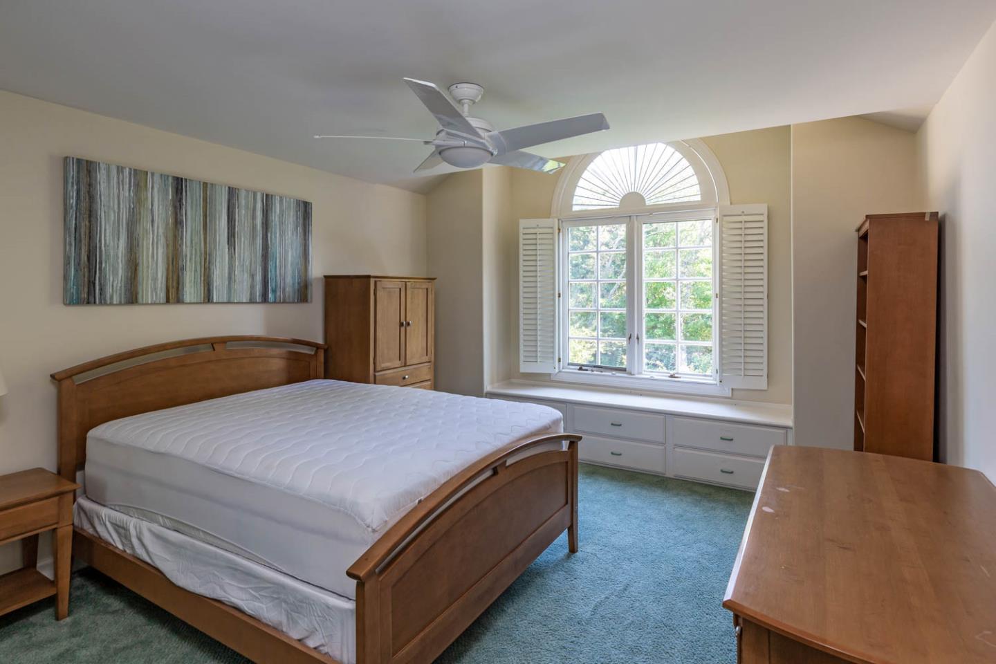 340 Jane Drive Woodside, CA 94062 - Photo 24 of 48 a bedroom with a bed and a window