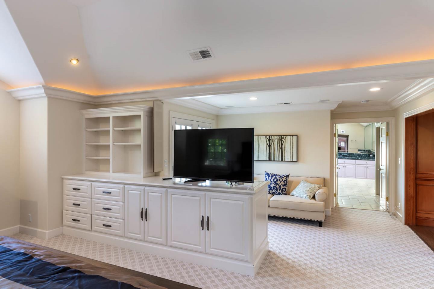 340 Jane Drive Woodside, CA 94062 - Photo 27 of 48 a living room with furniture and a flat screen tv