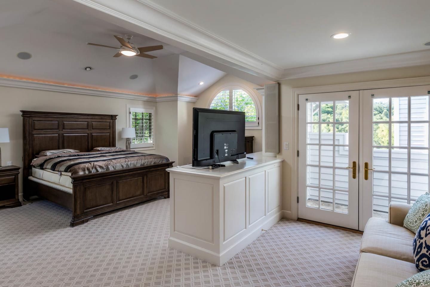 340 Jane Drive Woodside, CA 94062 - Photo 28 of 48 a bedroom with a large bed and a couch