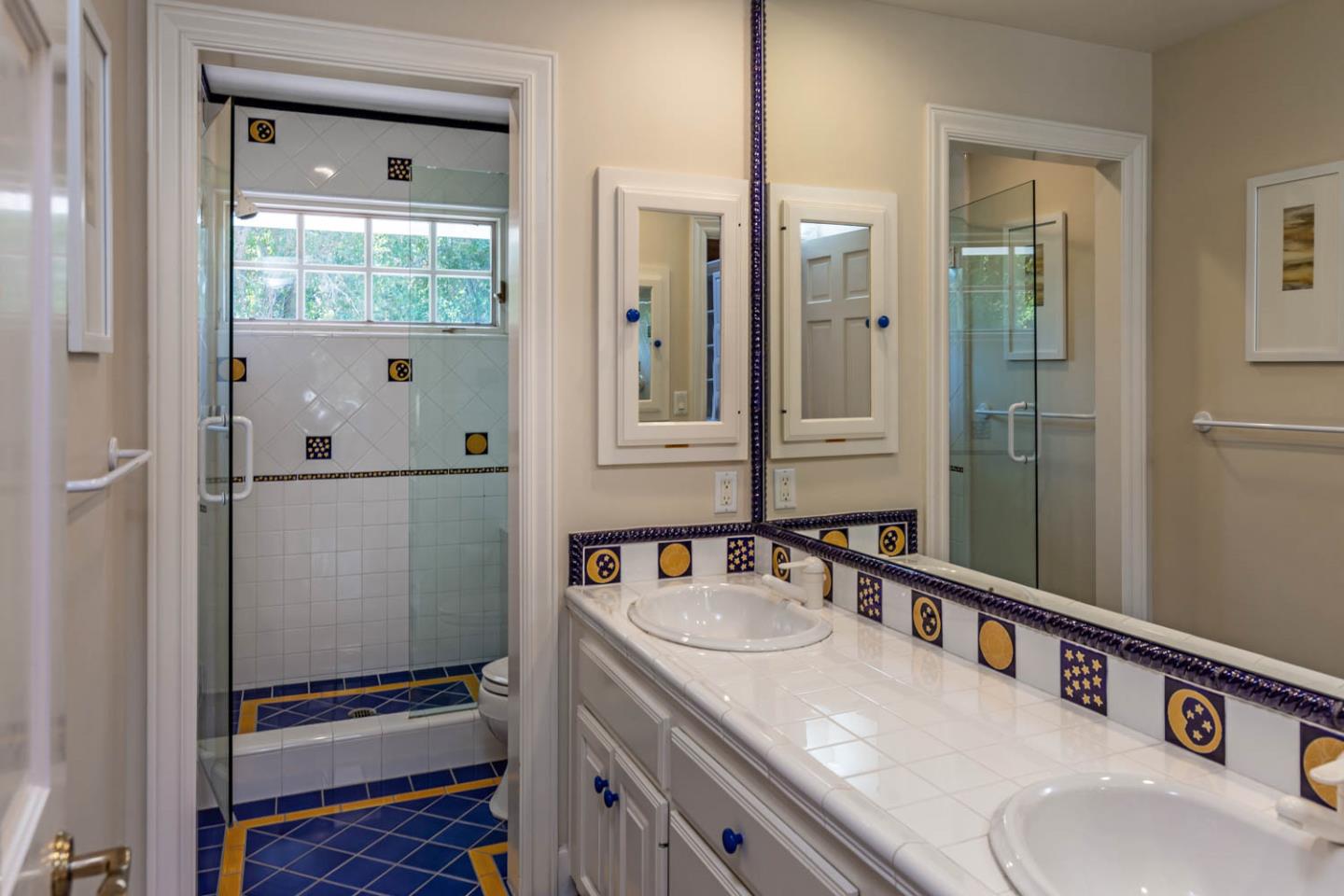 340 Jane Drive Woodside, CA 94062 - Photo 32 of 48 a bathroom with a sink and a mirror