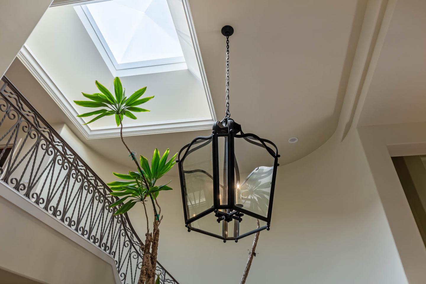 340 Jane Drive Woodside, CA 94062 - Photo 35 of 48 a vase of flowers sitting on a floor