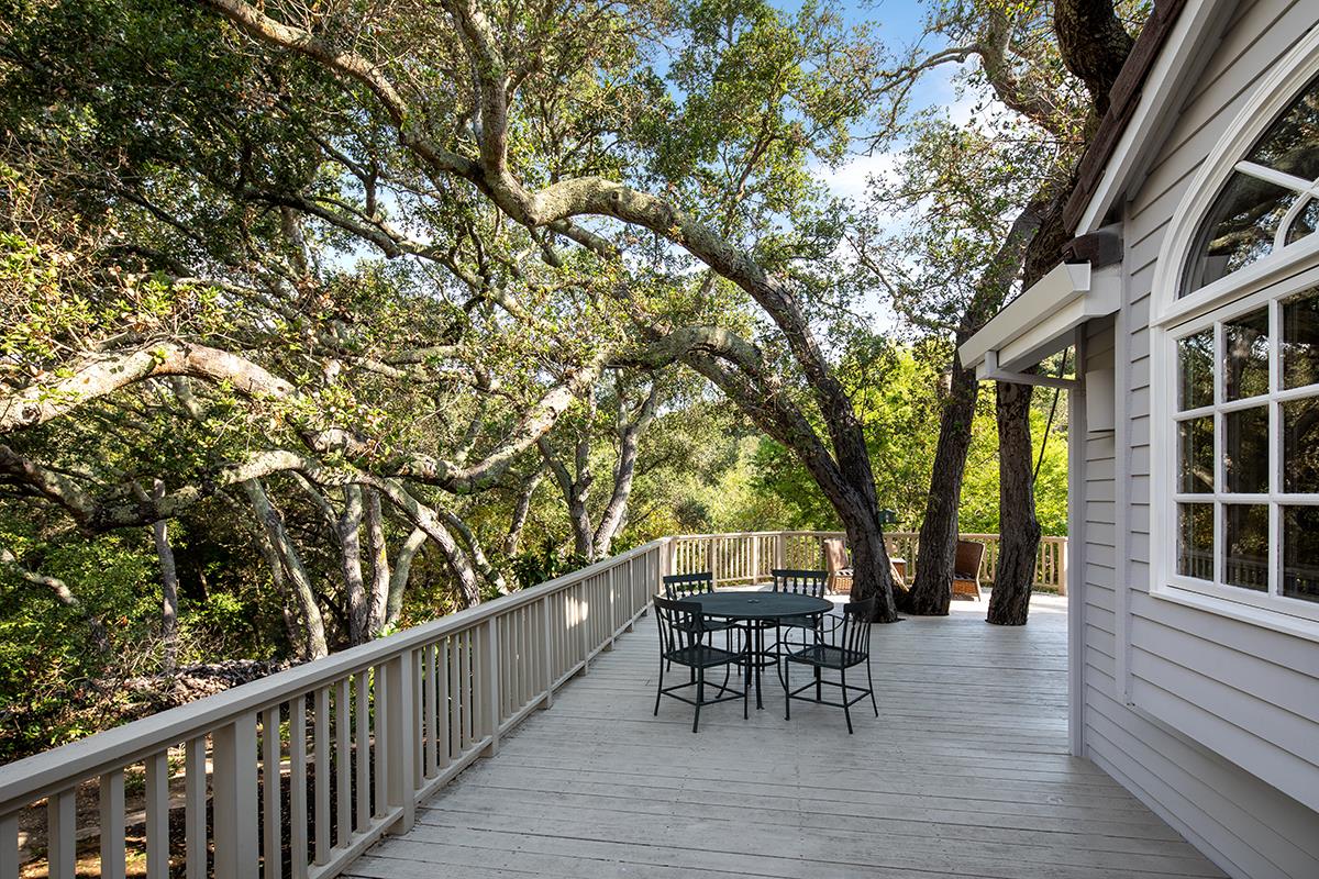 340 Jane Drive Woodside, CA 94062 - Photo 40 of 48 a view of a porch with furniture and trees