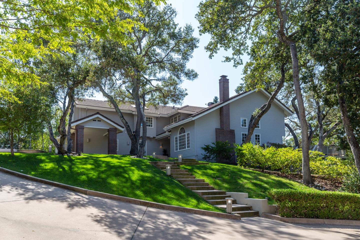 340 Jane Drive Woodside, CA 94062 - Photo 43 of 48 a house that has a tree in front of it