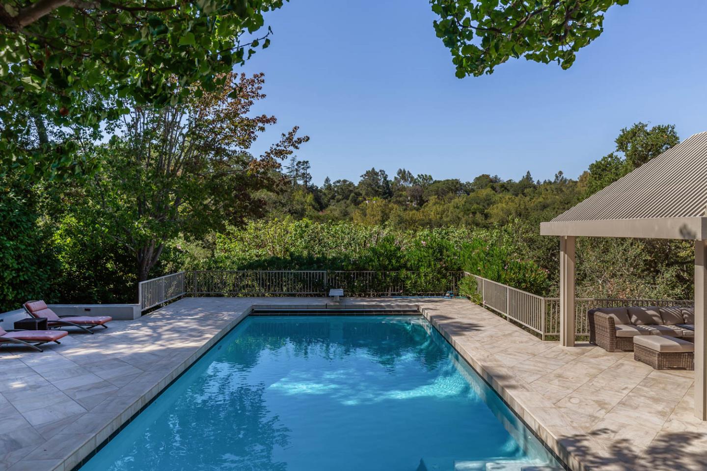 340 Jane Drive Woodside, CA 94062 - Photo 6 of 48 a view of a swimming pool with a patio