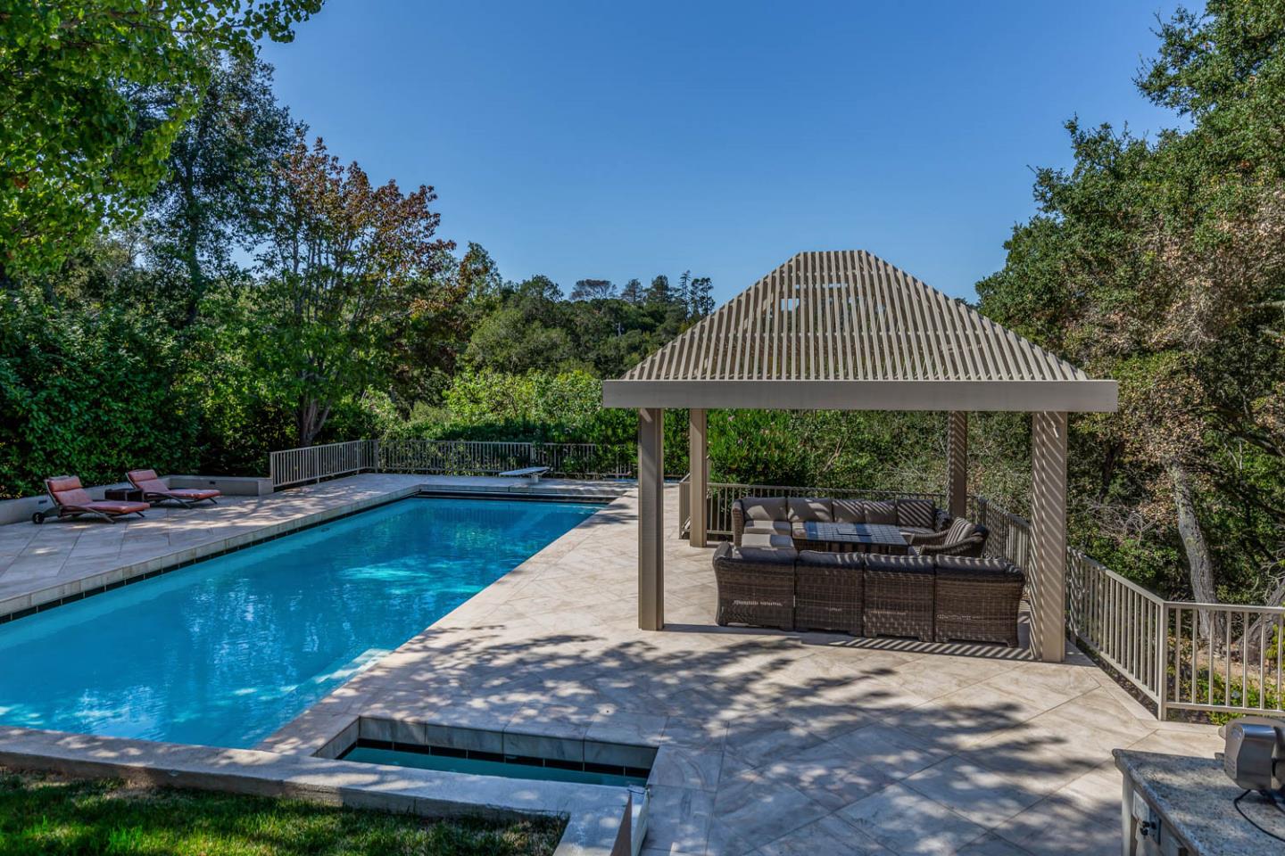 340 Jane Drive Woodside, CA 94062 - Photo 8 of 48 a view of a swimming pool with a patio