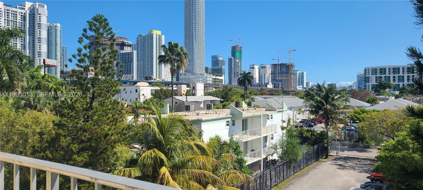 453 Southwest 2nd Street, Unit 306C Miami, FL 33130 - Photo 11 of 18 a view of a city with tall buildings