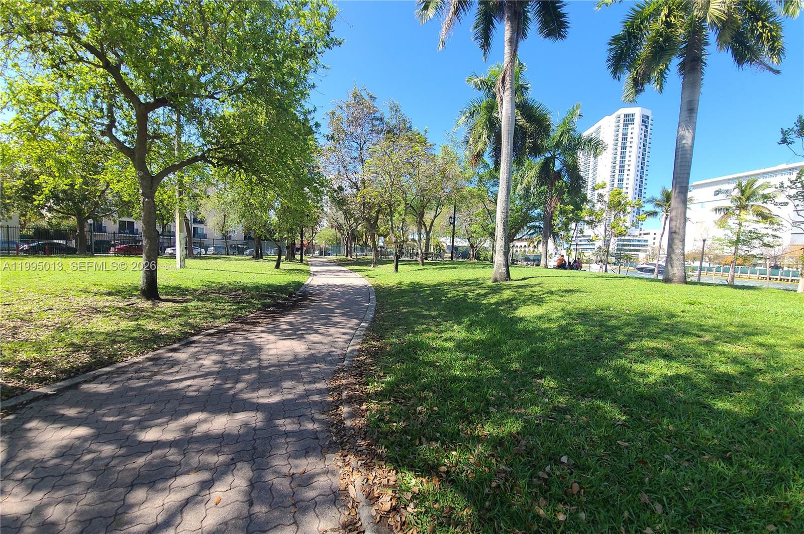453 Southwest 2nd Street, Unit 306C Miami, FL 33130 - Photo 16 of 18 a view of a park with palm trees