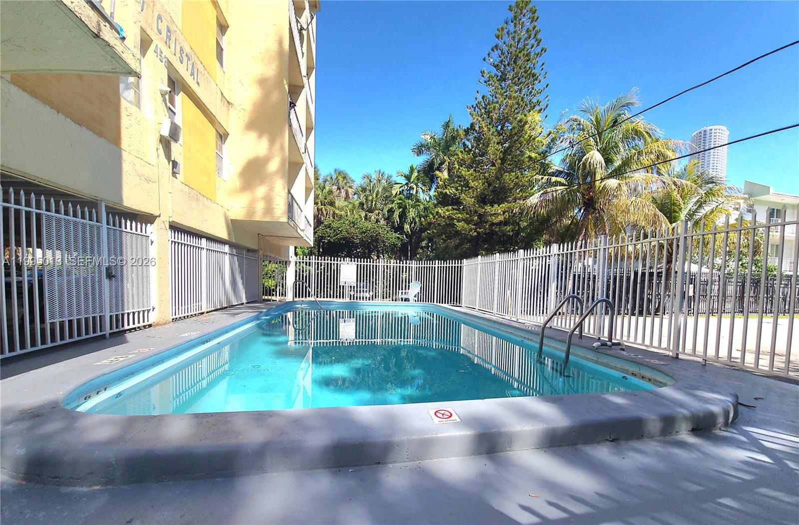 453 Southwest 2nd Street, Unit 306C Miami, FL 33130 - Photo 8 of 18 a view of a backyard with a garden