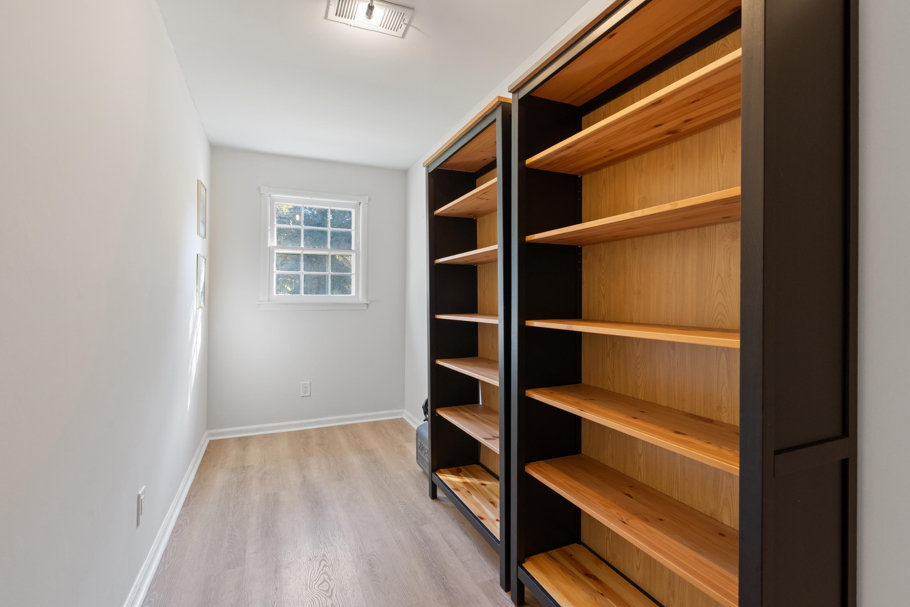 301 Dove Valley Road Collierville, TN 38017 - Photo 13 of 32 a view of an empty room with empty racks