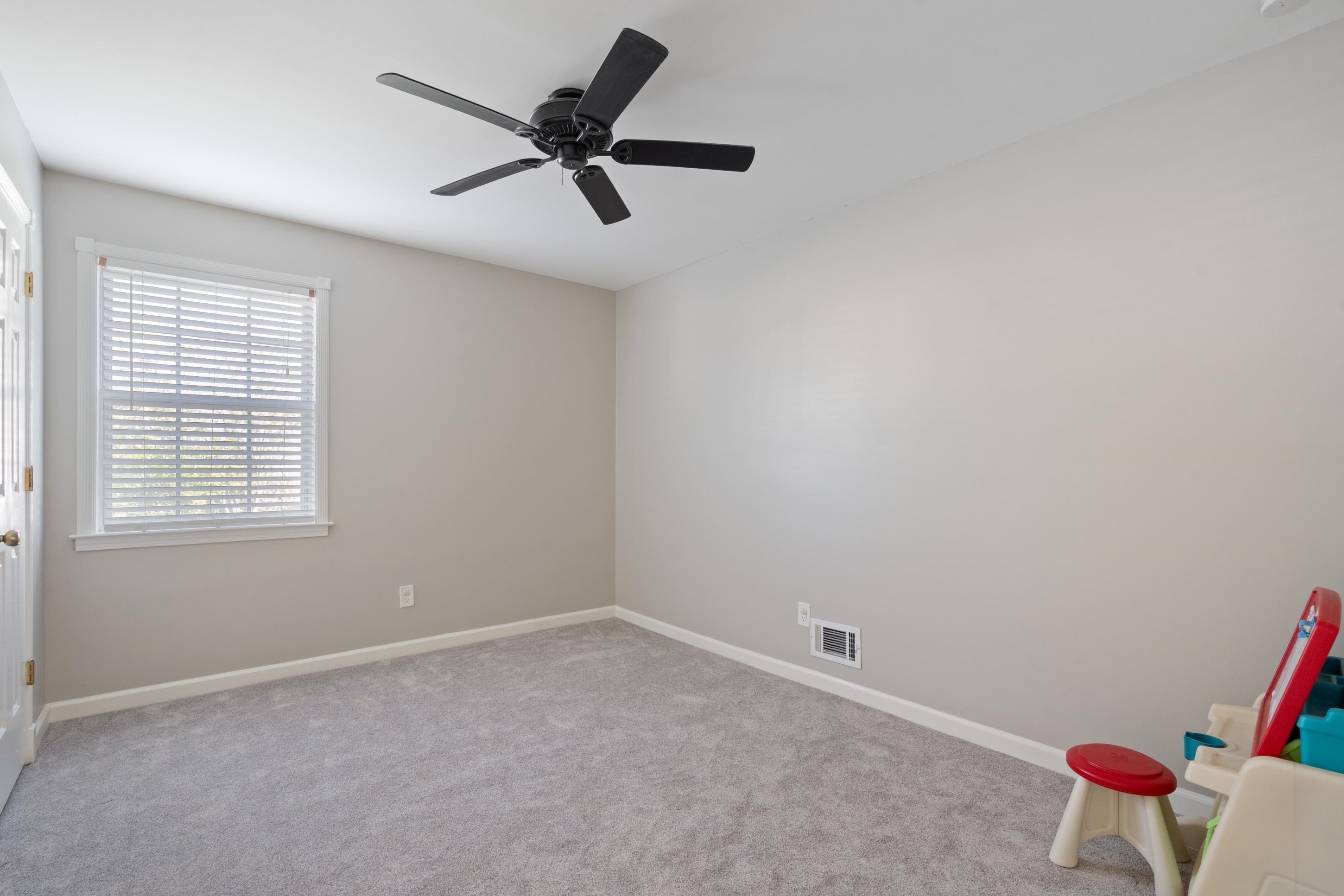 301 Dove Valley Road Collierville, TN 38017 - Photo 16 of 32 a view of a livingroom with a ceiling fan and window