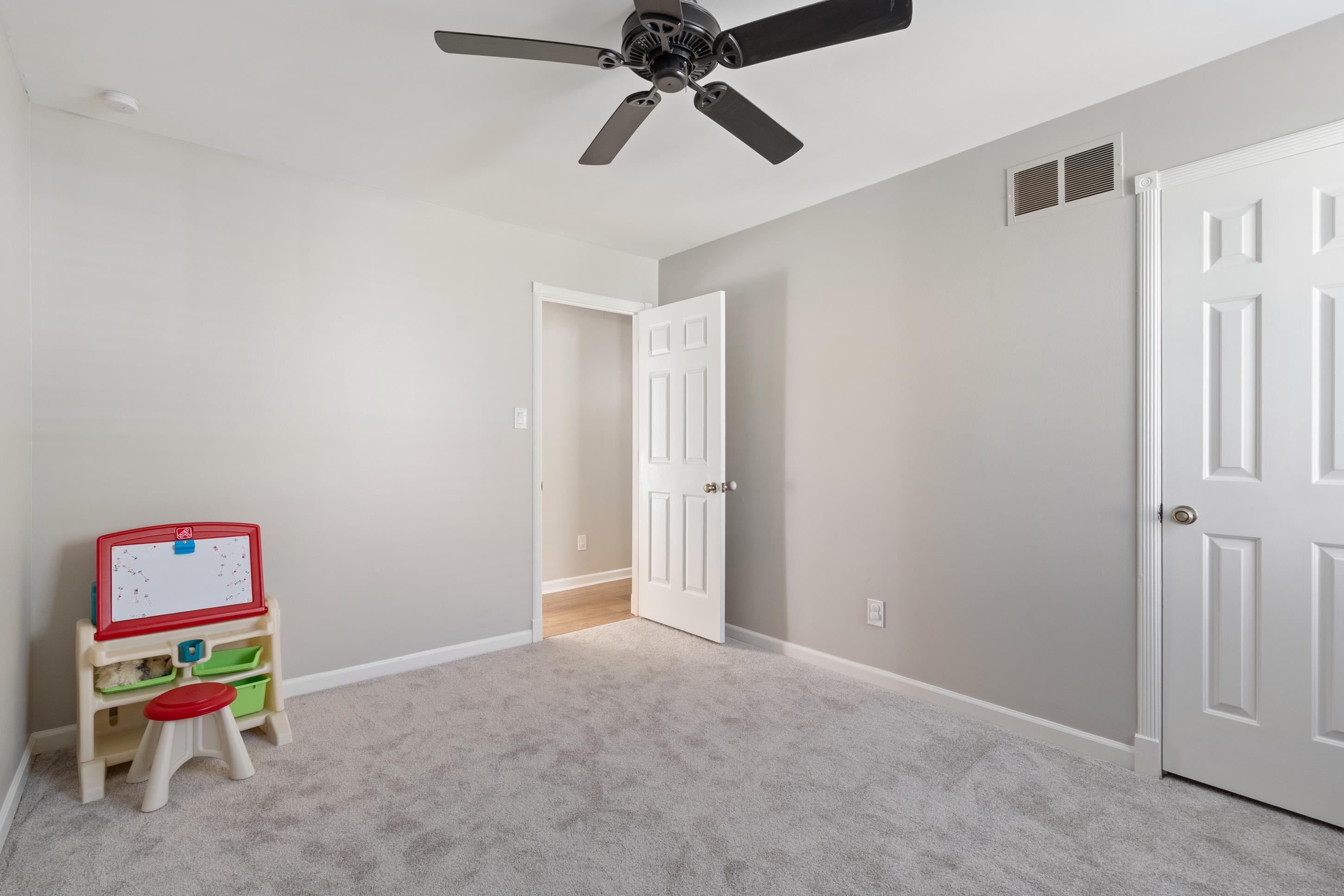 301 Dove Valley Road Collierville, TN 38017 - Photo 17 of 32 a room with a ceiling fan and a window