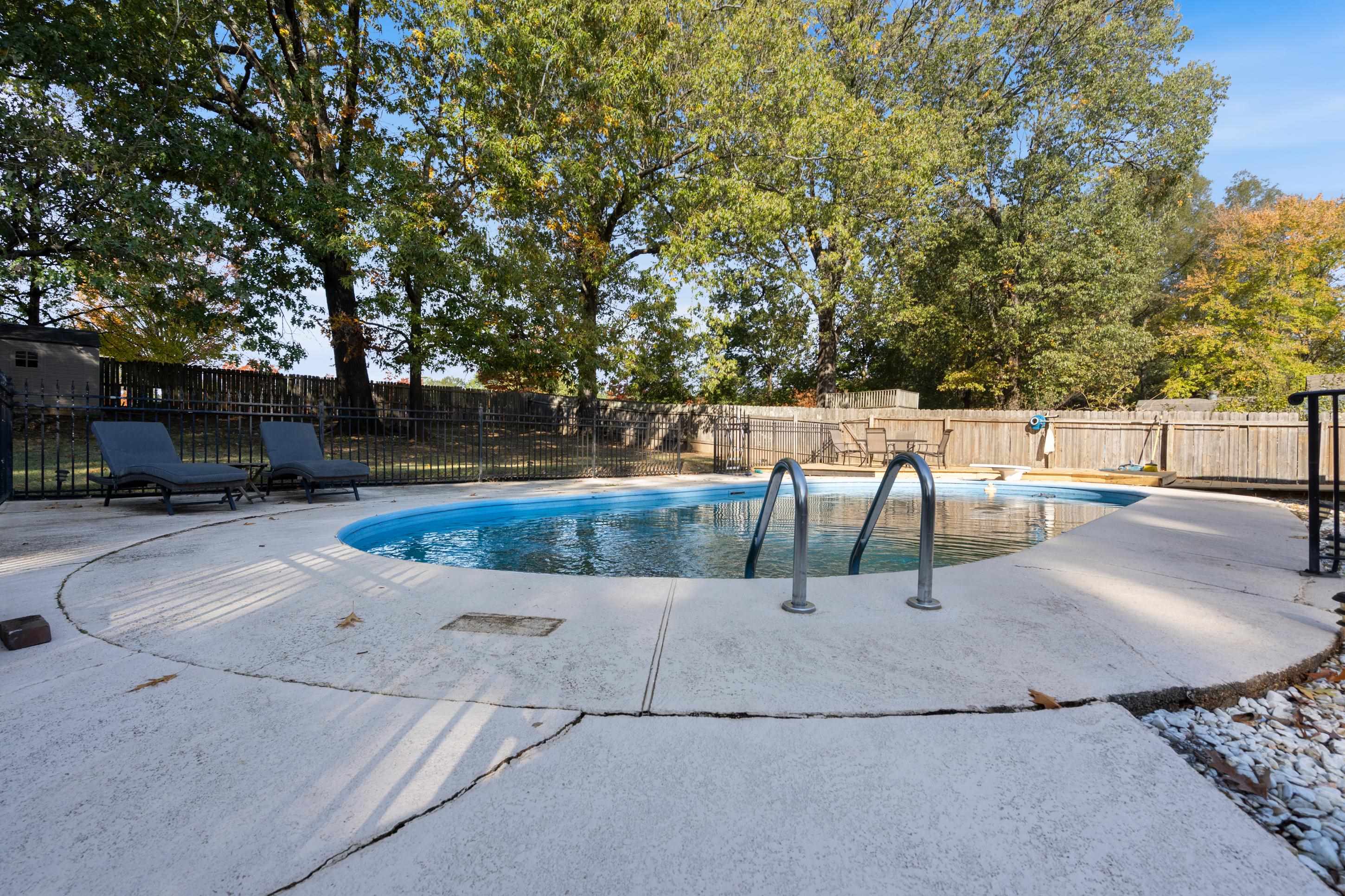 301 Dove Valley Road Collierville, TN 38017 - Photo 23 of 32 a view of backyard with swimming pool