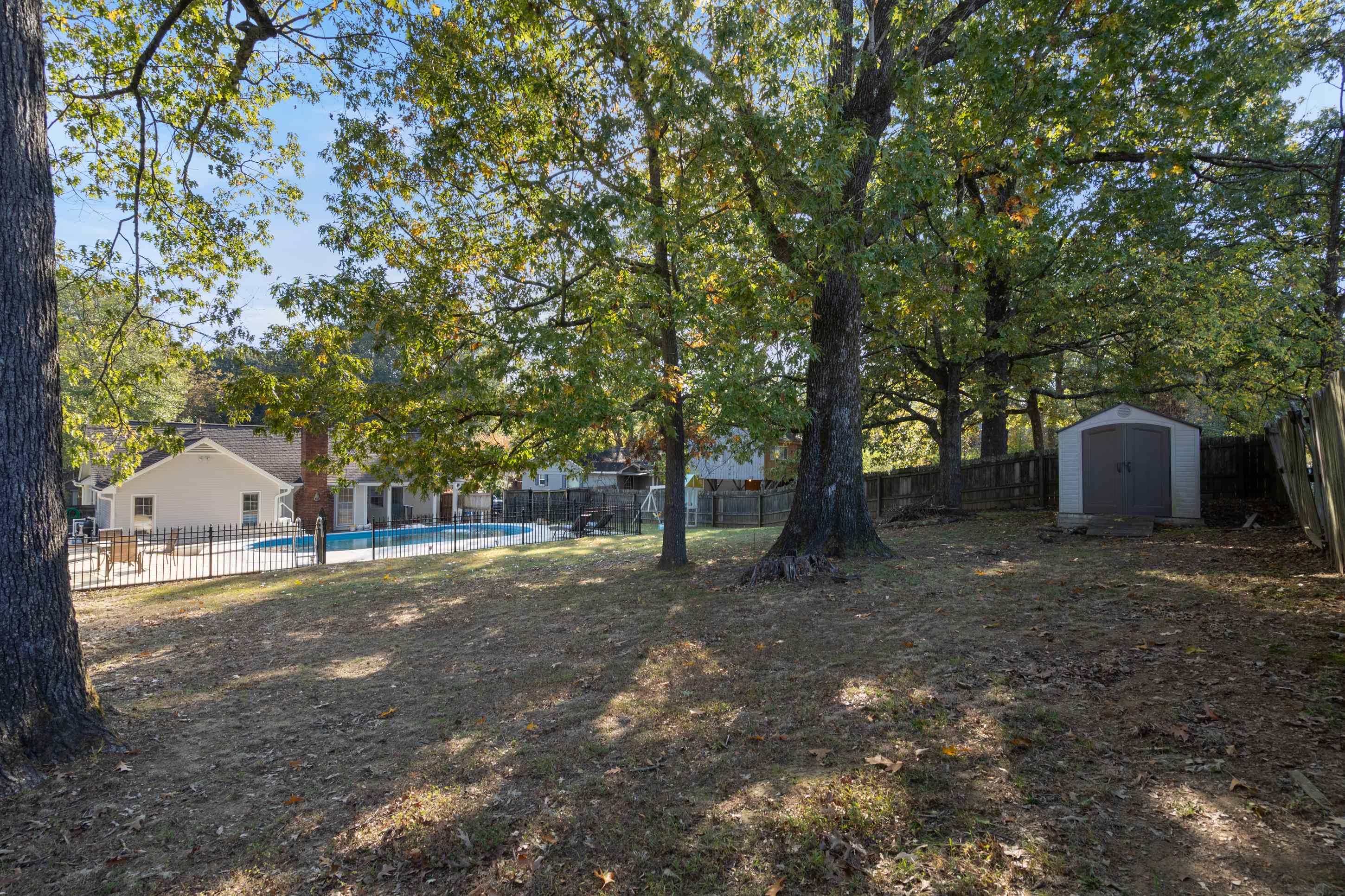 301 Dove Valley Road Collierville, TN 38017 - Photo 26 of 32 a view of a house with a yard