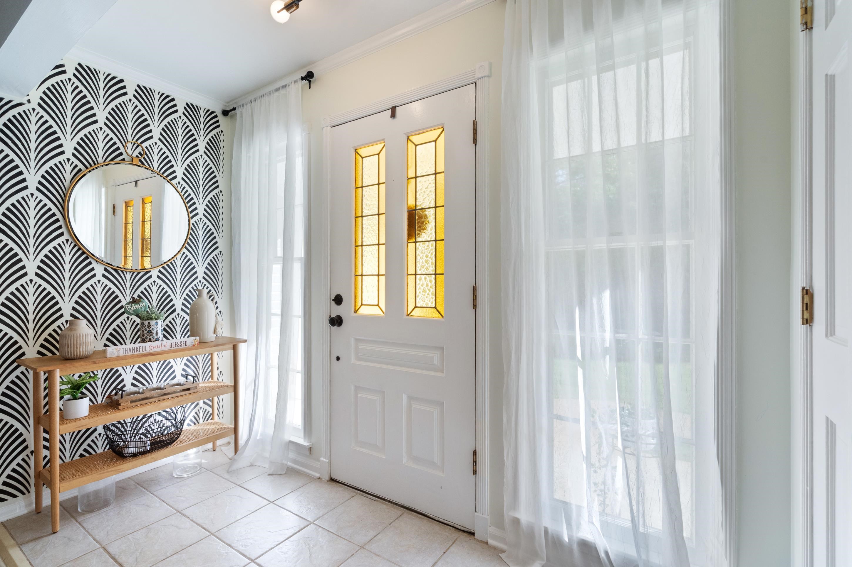 301 Dove Valley Road Collierville, TN 38017 - Photo 4 of 32 a view of an entryway with wooden floor