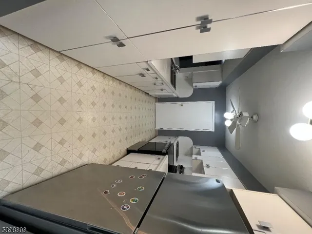 a bathroom with a sink and mirror