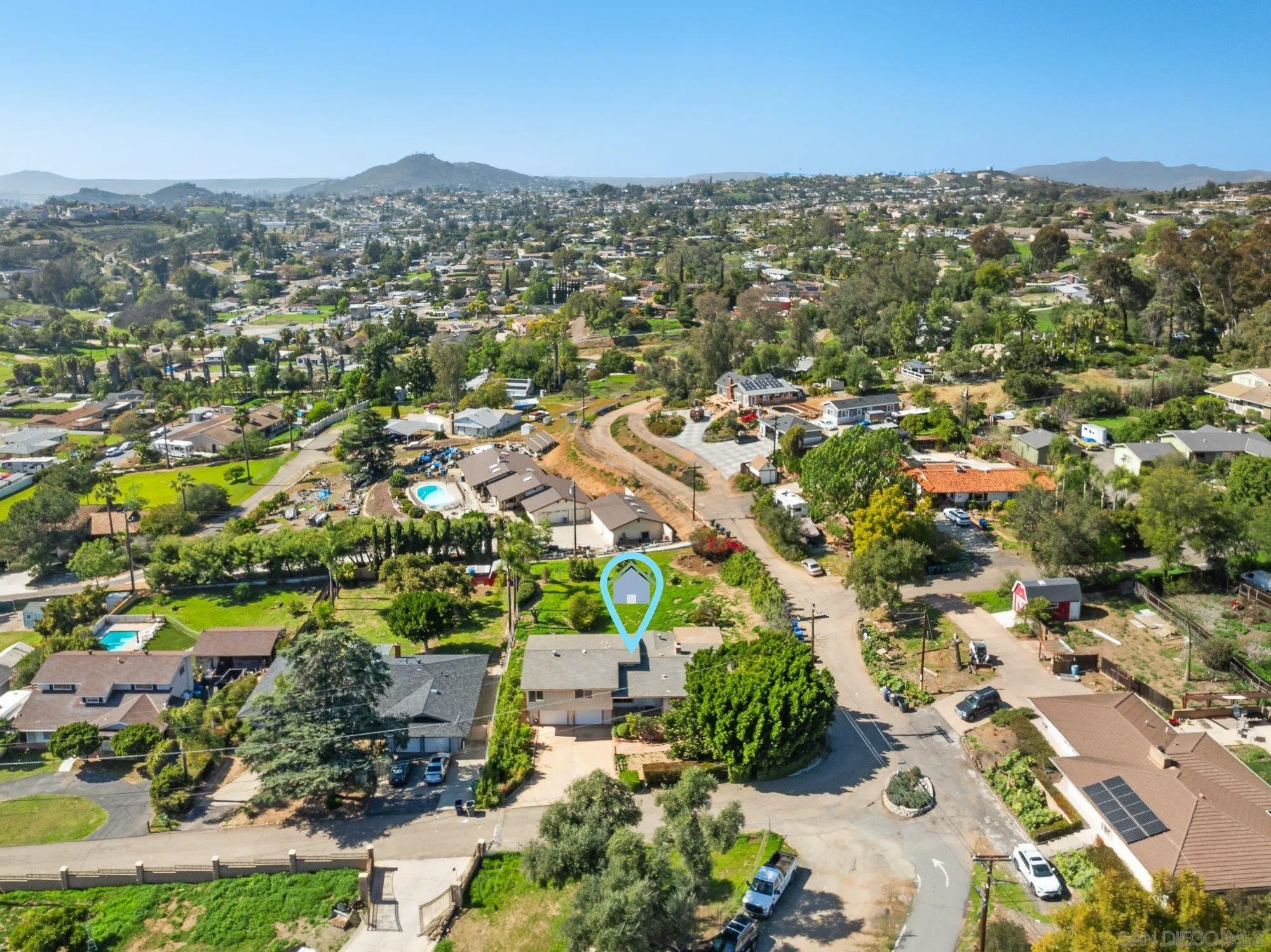 1999 Valley Rim Road El Cajon, CA 92019 - Photo 4 of 41 an aerial view of residential houses with outdoor space and trees