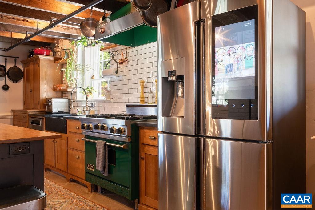 631 Old Rectory Lane Fork Union, VA 23055 - Photo 18 of 65 a kitchen with stainless steel appliances granite countertop a stove a refrigerator and a sink