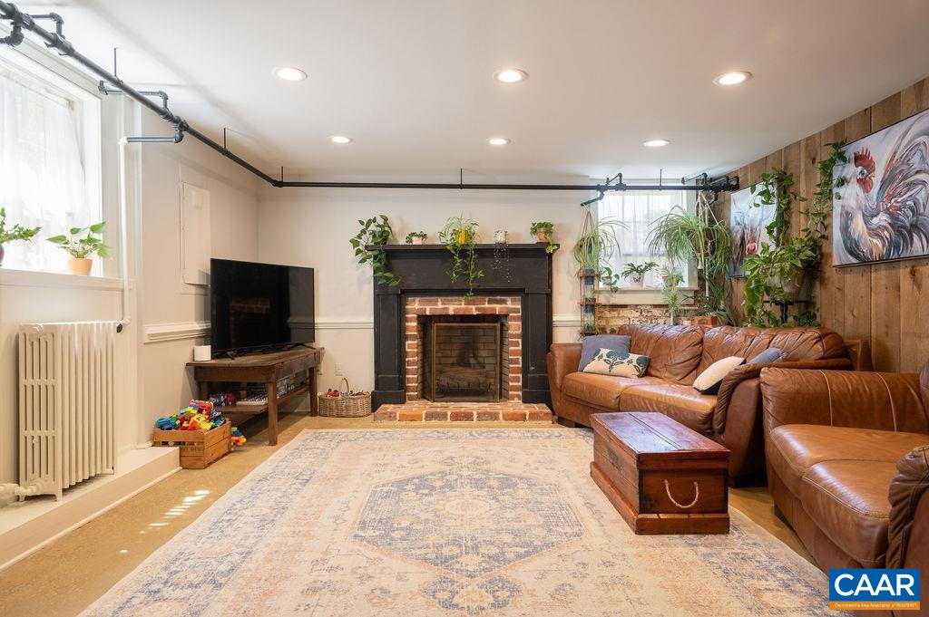 631 Old Rectory Lane Fork Union, VA 23055 - Photo 22 of 65 a living room with furniture and a flat screen tv