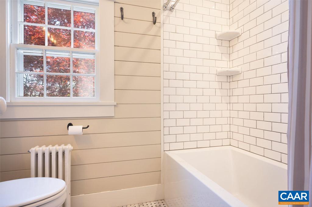 631 Old Rectory Lane Fork Union, VA 23055 - Photo 28 of 65 a bathroom with a bathtub and next to a window