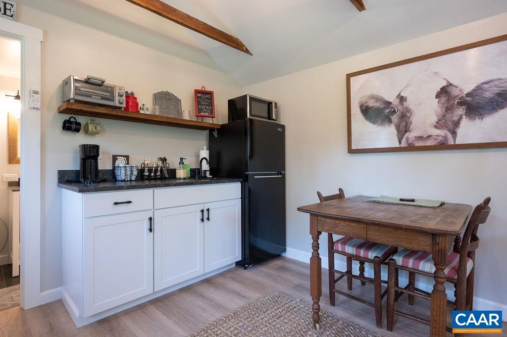 631 Old Rectory Lane Fork Union, VA 23055 - Photo 39 of 65 a kitchen with stainless steel appliances a refrigerator and cabinets