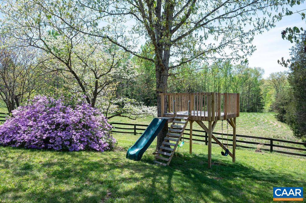 631 Old Rectory Lane Fork Union, VA 23055 - Photo 43 of 65 a view of park with bench and garden
