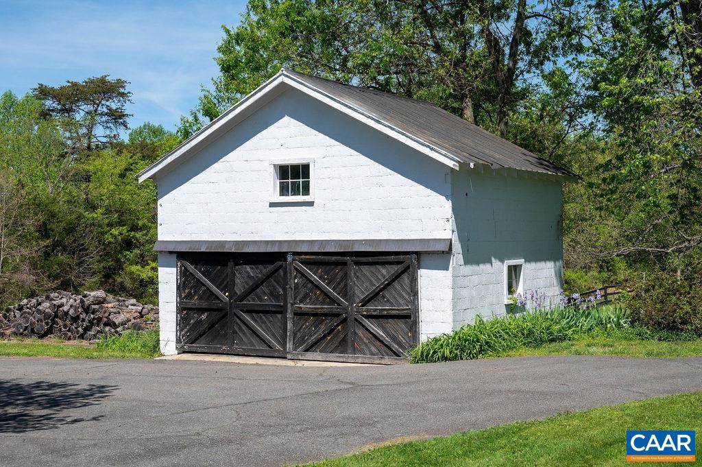 631 Old Rectory Lane Fork Union, VA 23055 - Photo 44 of 65 a front view of a house with garden