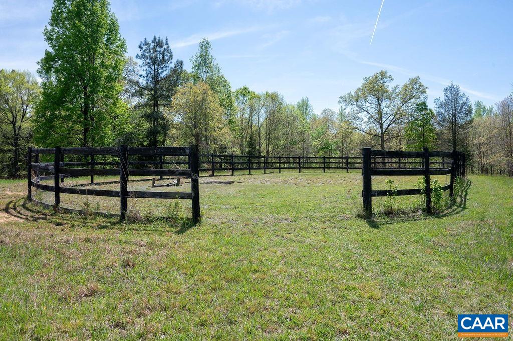 631 Old Rectory Lane Fork Union, VA 23055 - Photo 55 of 65 a view of a bench sitting in the middle of a park