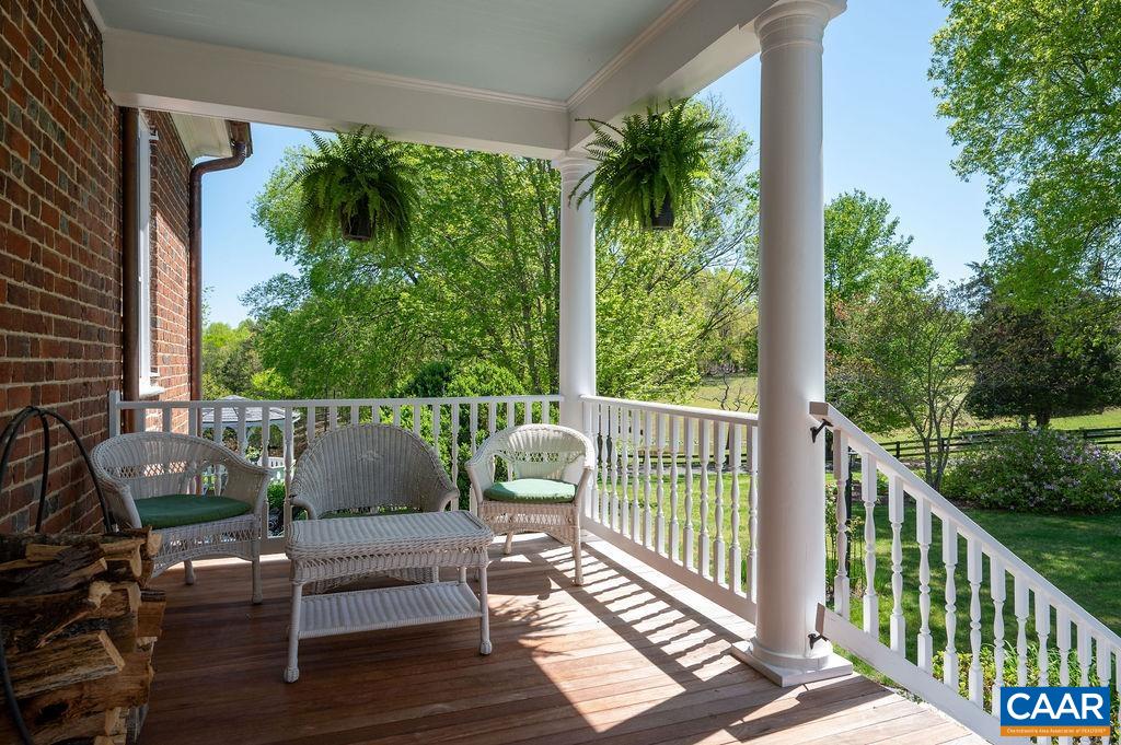 631 Old Rectory Lane Fork Union, VA 23055 - Photo 8 of 65 a view of a chair and table in the balcony