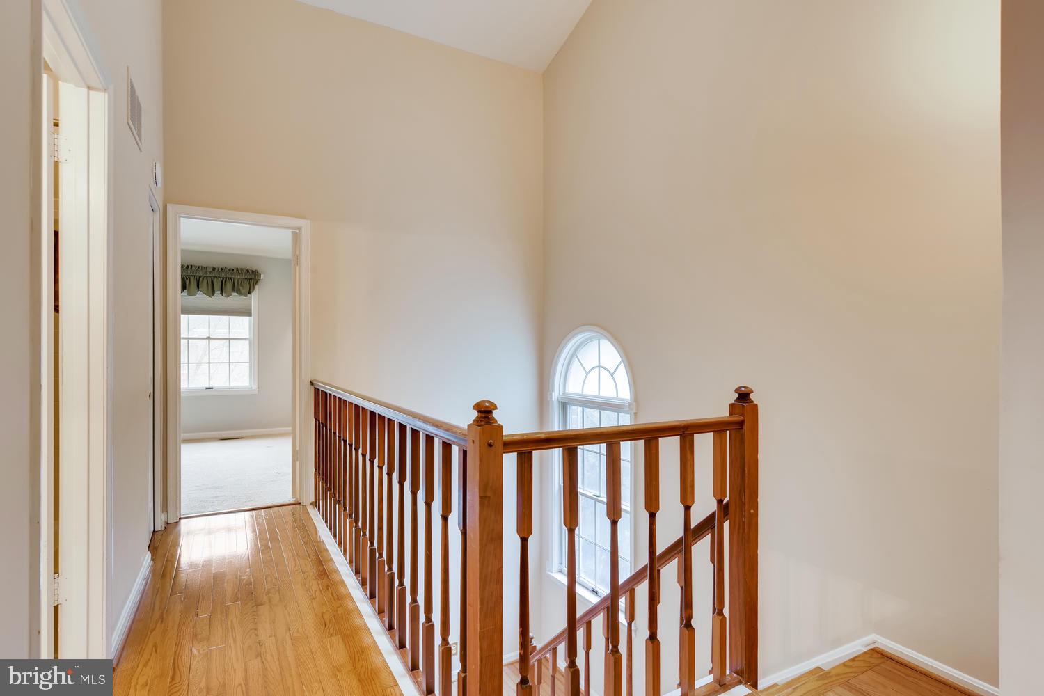 512 Kinsale Road Lutherville-Timonium, MD 21093 - Photo 22 of 37 Second level hallway with hardwood floors